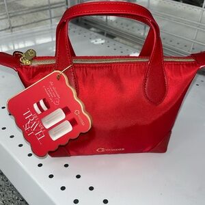 C. Wonder Vibrant Red Cosmetic Bag